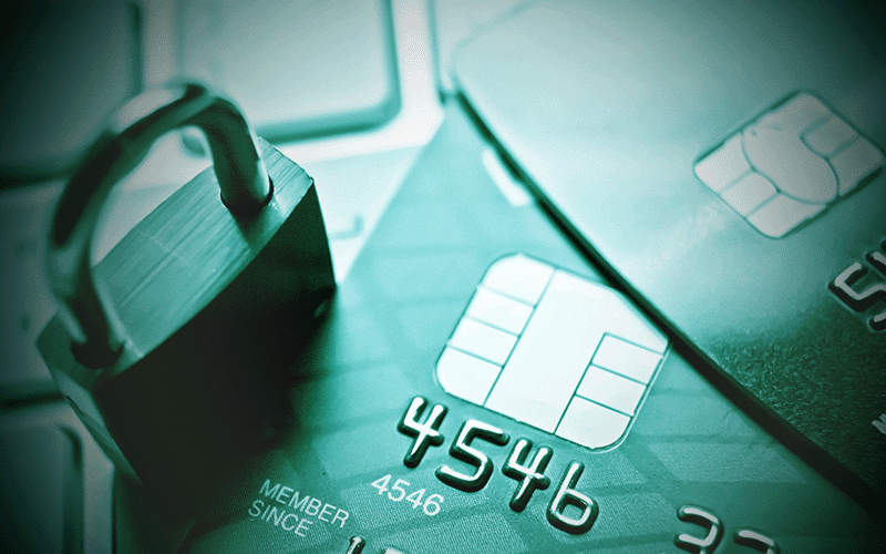 Credit card, keyboard and lock to represent ecommerce fraud prevention