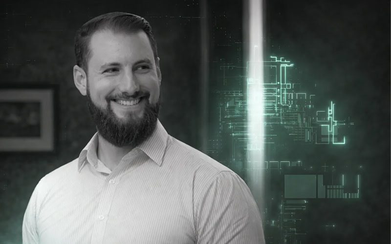 Cybersecurity professional reviewing digital data for SpyCloud cybersecurity services.