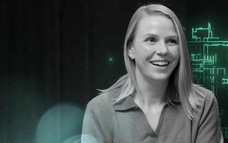 Cybersecurity professional at a tech event promoting SpyCloud solutions.