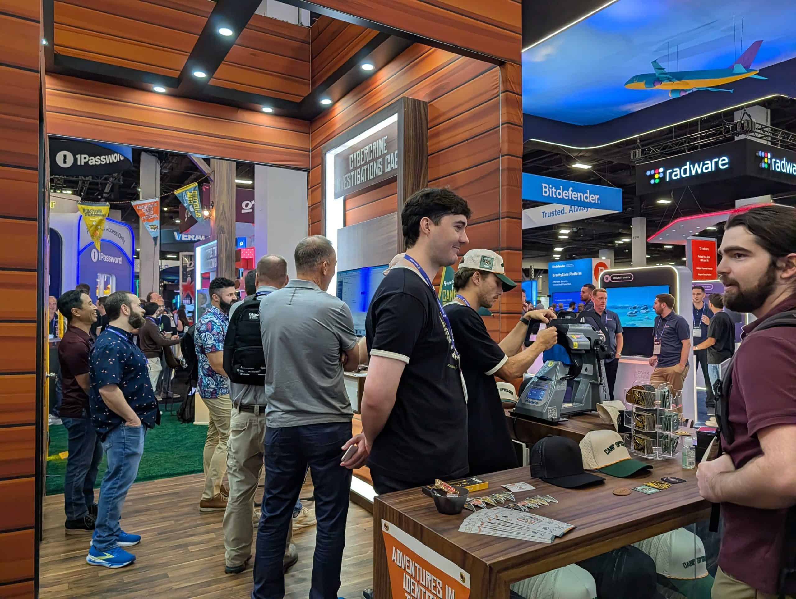 Attendees exploring cybersecurity booths at Black Hat USA 2026 conference.