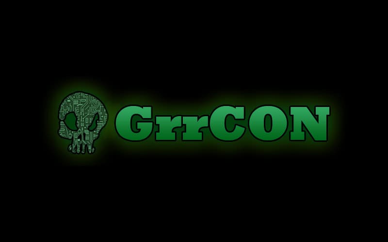 SpyCloud logo with skull and circuit design for GrrCON cybersecurity event.