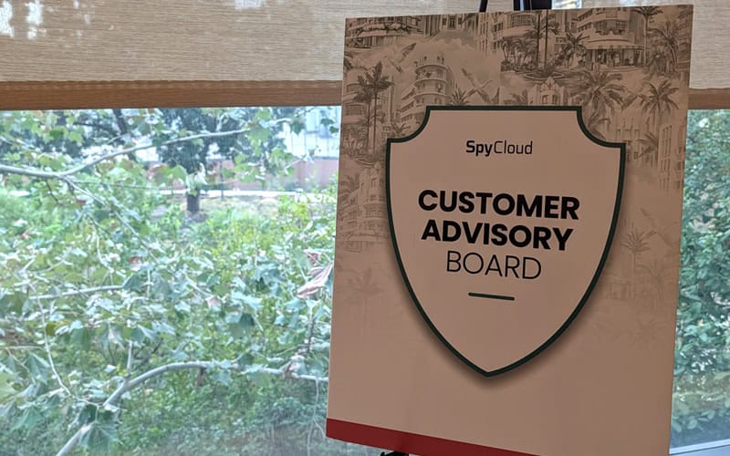 Customer advisory board sign for SpyCloud with shield design.
